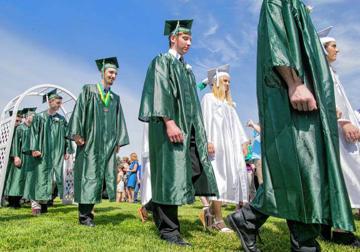 Graduates march into the Pembroke Academy ceremony on Saturday, June 9, 2018.