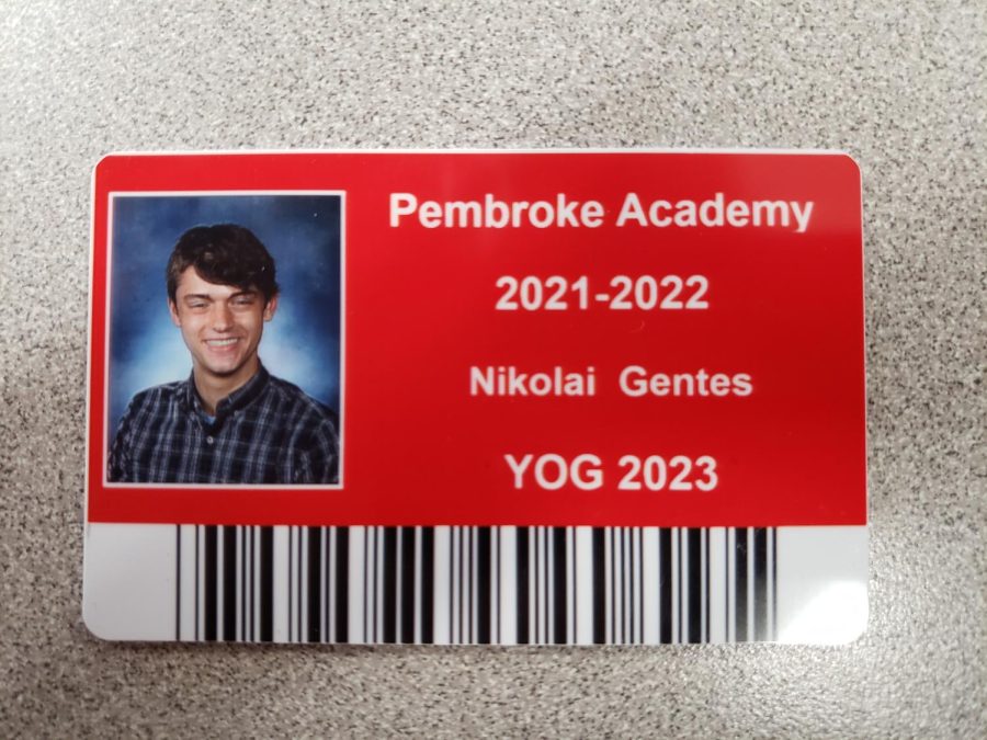 The person in the ID photo is not a 40-year-old man, rather staff writer Nikolai Gentes, a high school junior. 