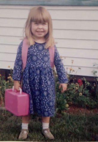 Staff writer Emily Polsin is seen here as a young girl rocking the pink lunchbox (photo courtesy of Emily Polsin).  