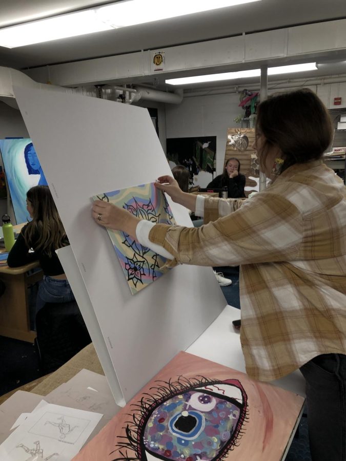 Art teacher Mrs. Kilrain is advising PAs Art Club, who are proposing murals for the building.