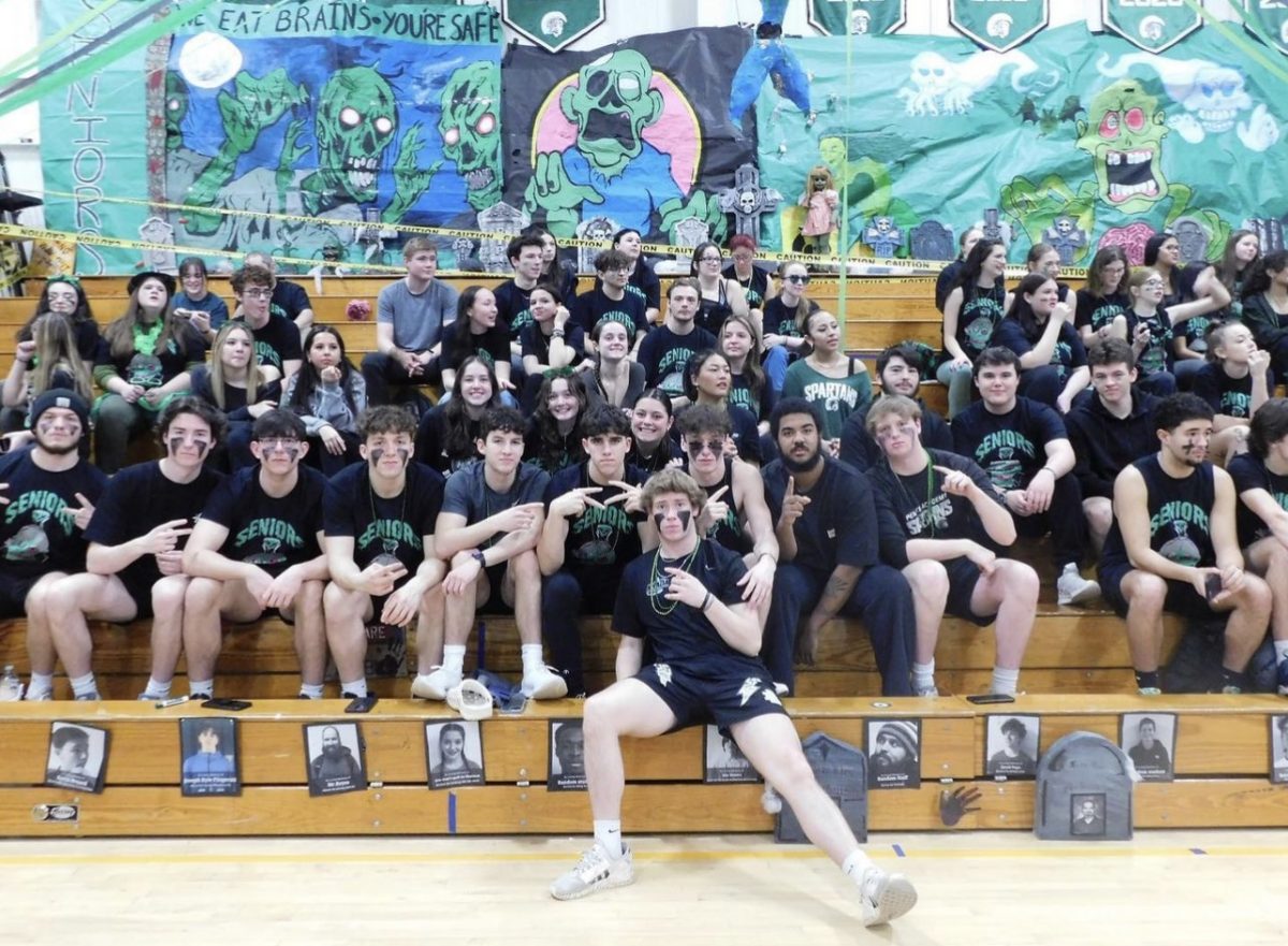 The senior class gathers for a photo at their final Winter Carnival. Staff writer Michael Cox (front row, second from the left) encourages seniors to savior it. 